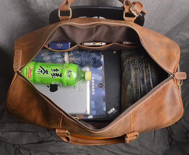 COWBOY ERA: Crazy Horse Leather Duffel for Gentlemen in Transit