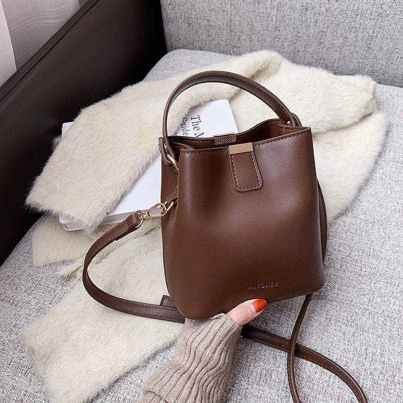 Pivot the Agenda – Mini Structured Bucket Crossbody
