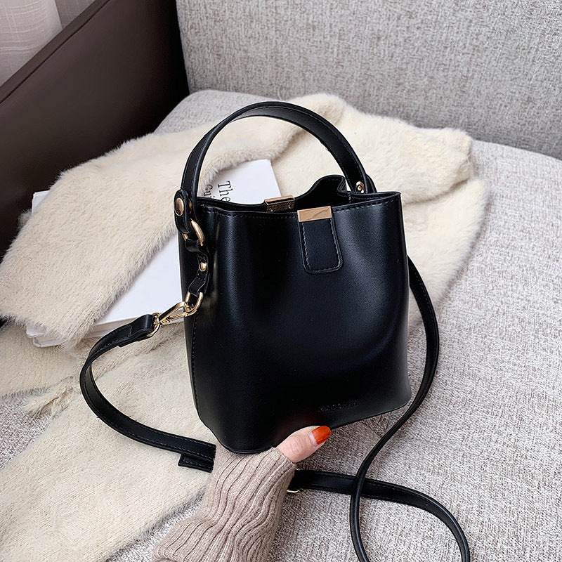 Pivot the Agenda – Mini Structured Bucket Crossbody