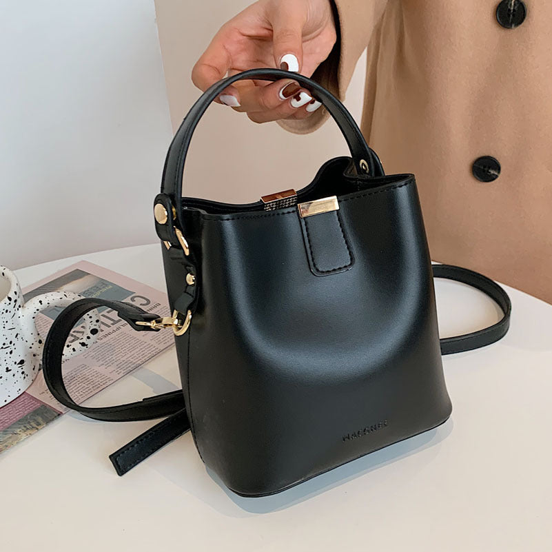 Pivot the Agenda – Mini Structured Bucket Crossbody