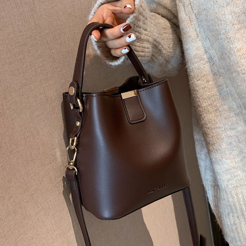 Pivot the Agenda – Mini Structured Bucket Crossbody