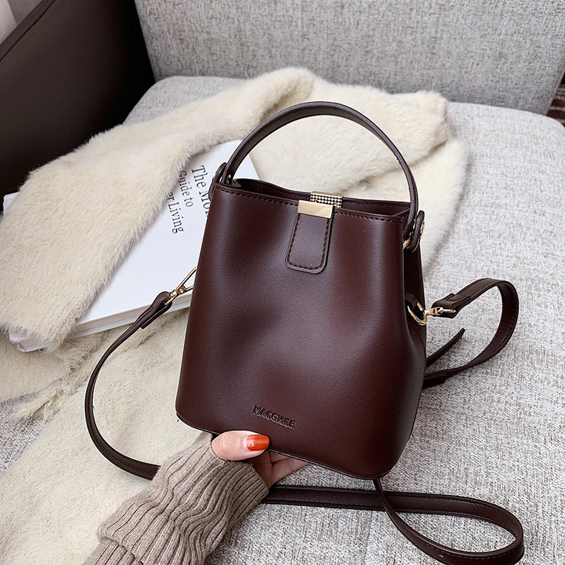 Pivot the Agenda – Mini Structured Bucket Crossbody