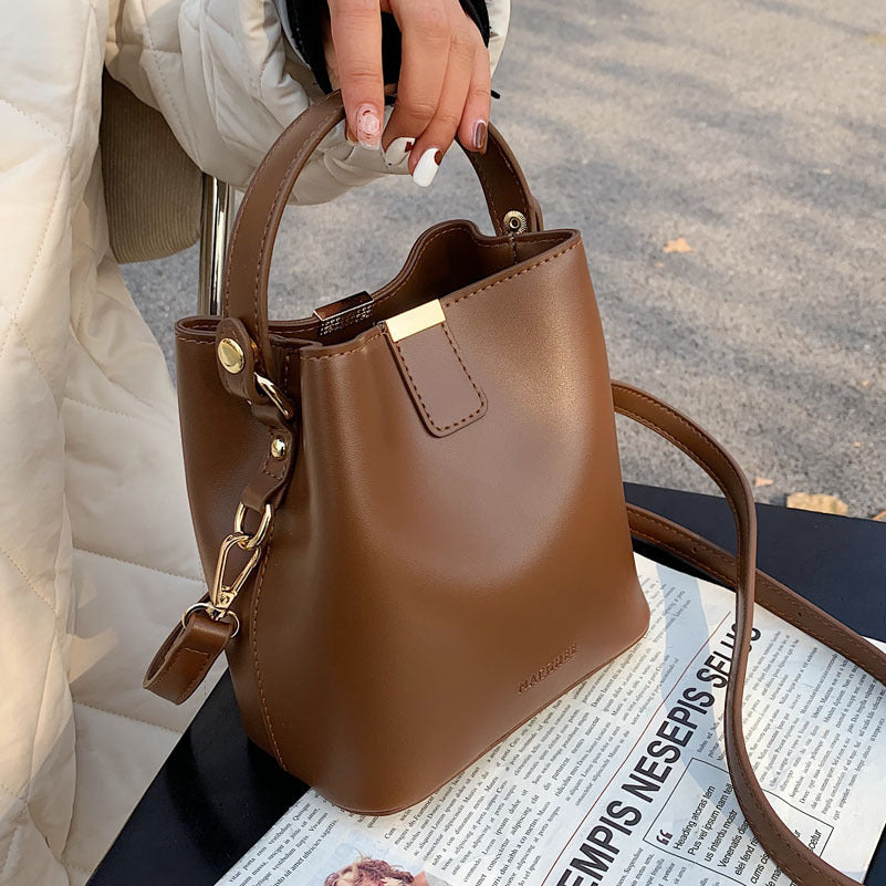 Pivot the Agenda – Mini Structured Bucket Crossbody