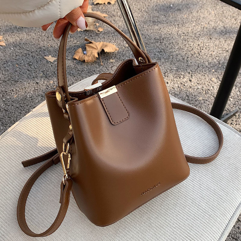 Pivot the Agenda – Mini Structured Bucket Crossbody