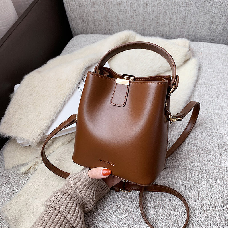 Pivot the Agenda – Mini Structured Bucket Crossbody