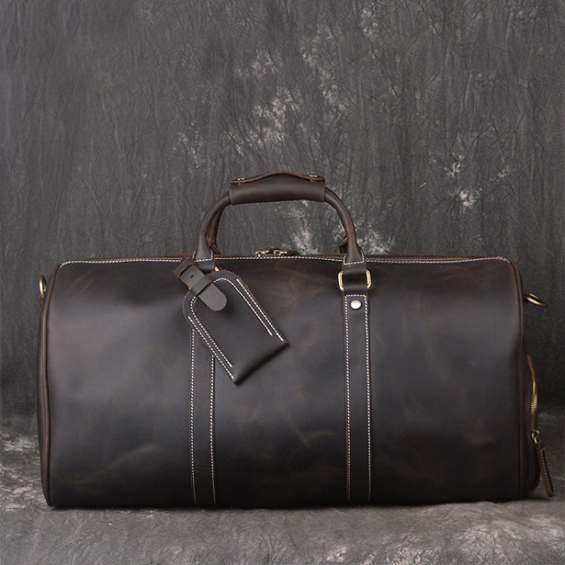 COWBOY ERA: Crazy Horse Leather Duffel for Gentlemen in Transit