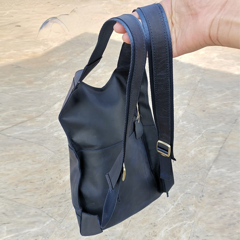 Lose Yourself in Notes  – Modernist Cowhide Backpack
