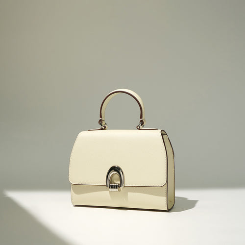 Halo Chic – Elegant Cowhide Shoulder Handbag