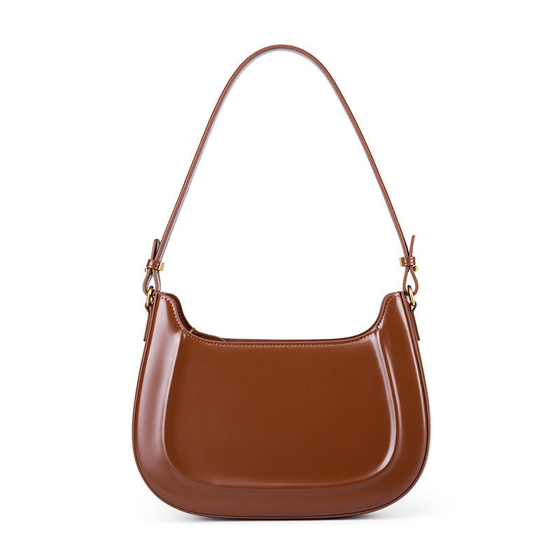 Velvet Season – Glossy Leather Saddle Bag for Elegant Days