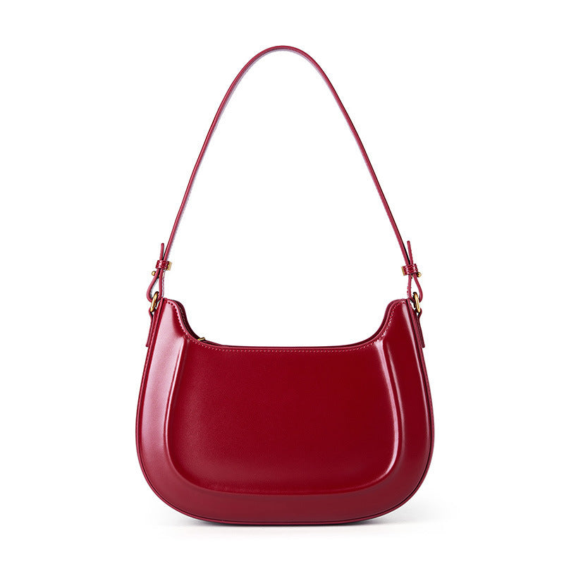 Velvet Season – Glossy Leather Saddle Bag for Elegant Days