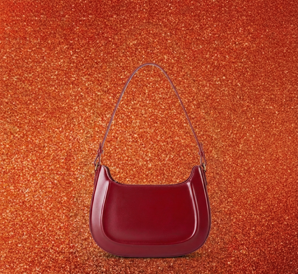 Velvet Season – Glossy Leather Saddle Bag for Elegant Days
