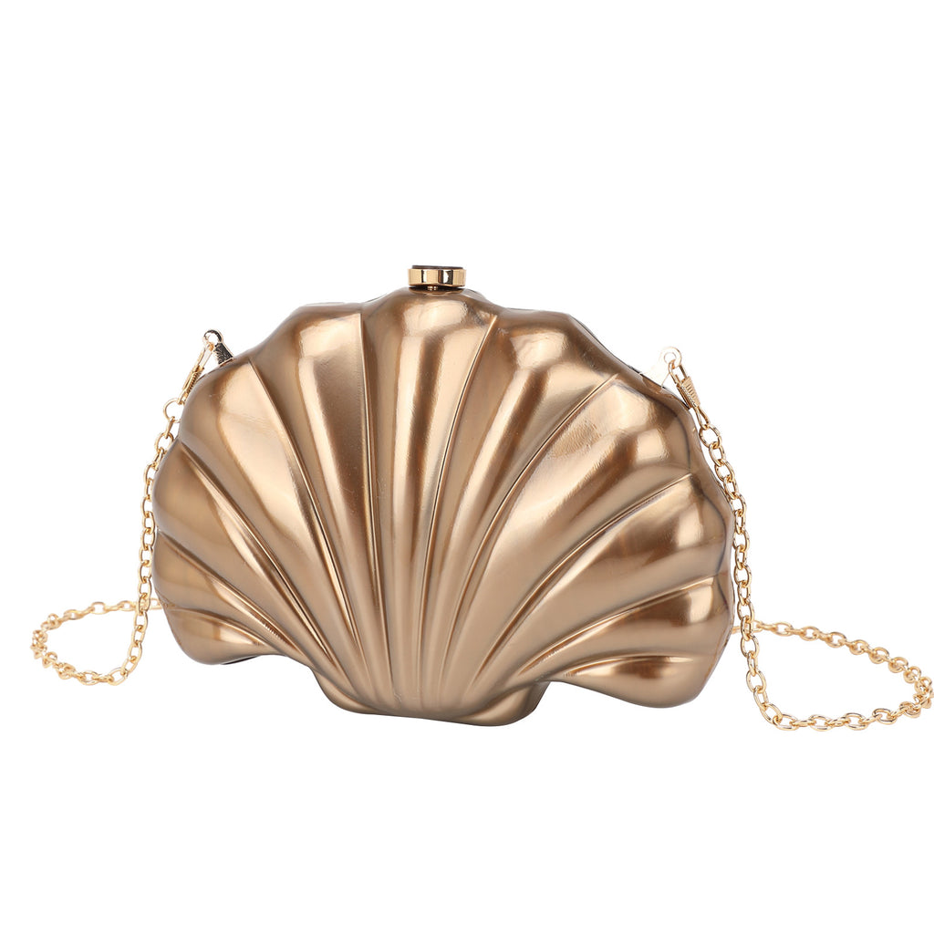 Shelloncé – Acrylic Shell Clutch with Pearl Handle
