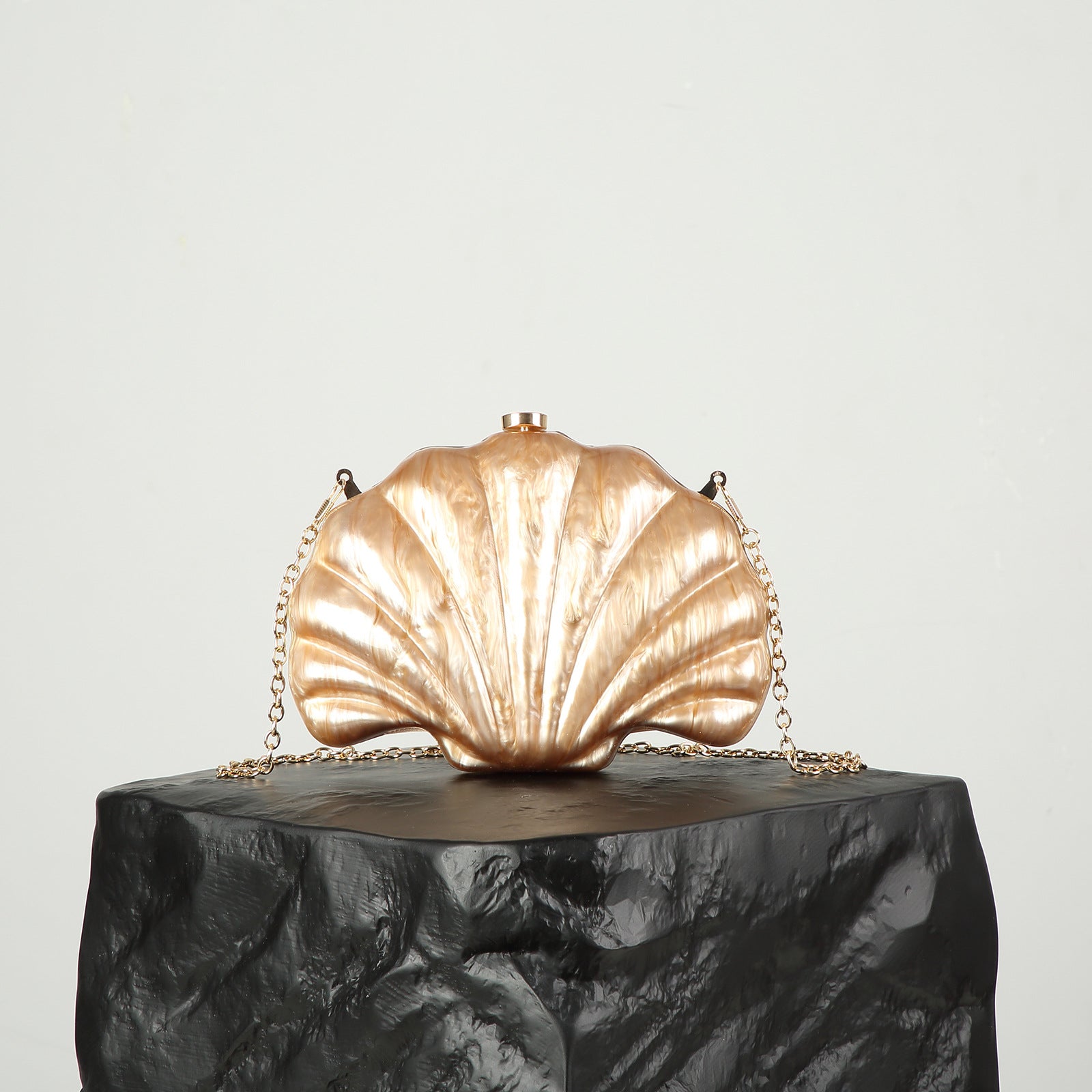 Shelloncé – Acrylic Shell Clutch with Pearl Handle