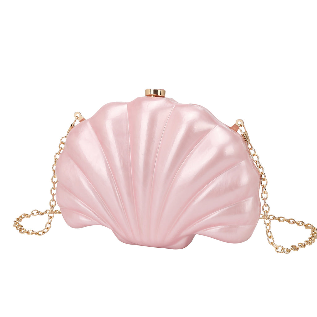 Shelloncé – Acrylic Shell Clutch with Pearl Handle