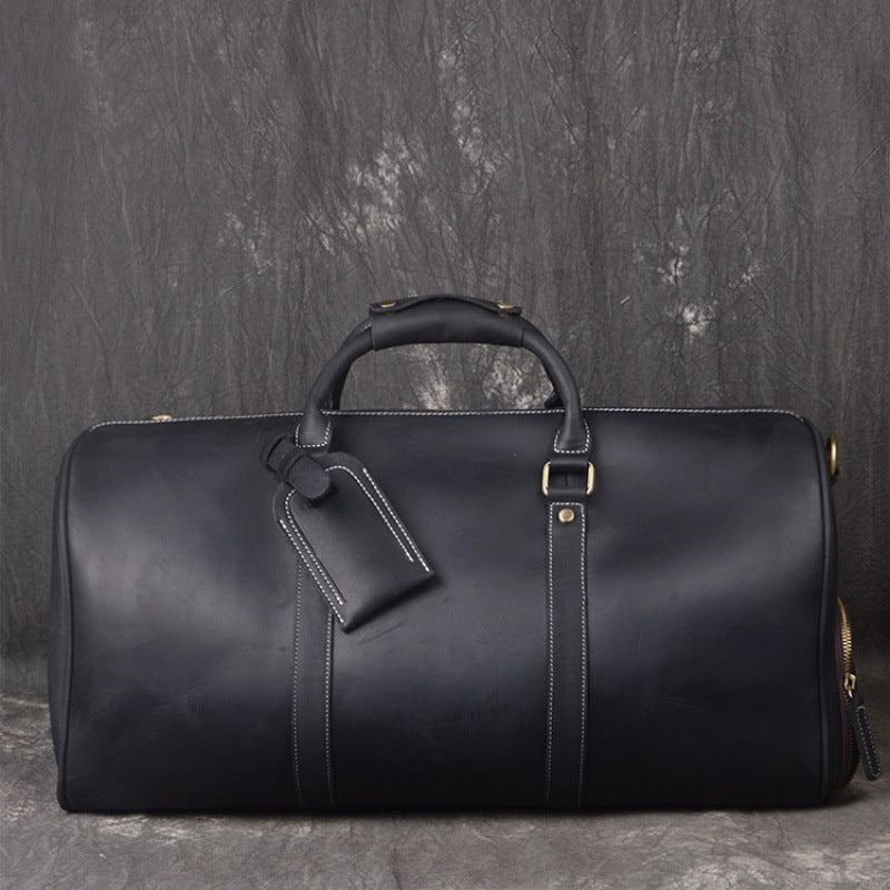 COWBOY ERA: Crazy Horse Leather Duffel for Gentlemen in Transit