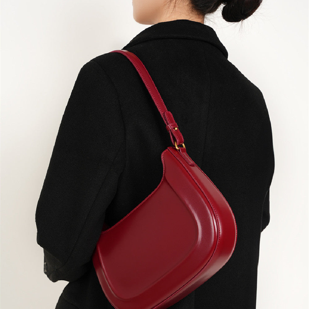 Velvet Season – Glossy Leather Saddle Bag for Elegant Days