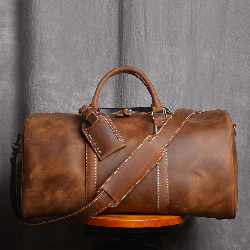 COWBOY ERA: Crazy Horse Leather Duffel for Gentlemen in Transit