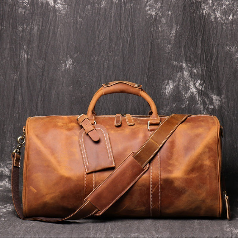 COWBOY ERA: Crazy Horse Leather Duffel for Gentlemen in Transit
