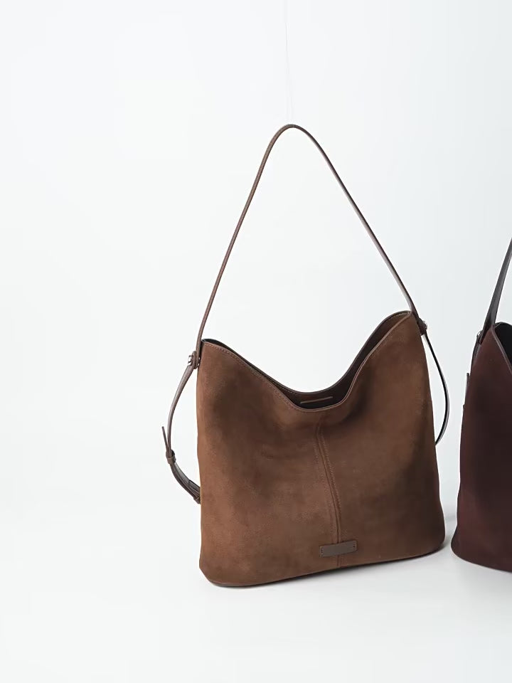 Levitating Luxe – Suede Bucket Crossbody